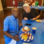 Residents enjoying a Father's Day brunch at Tempo